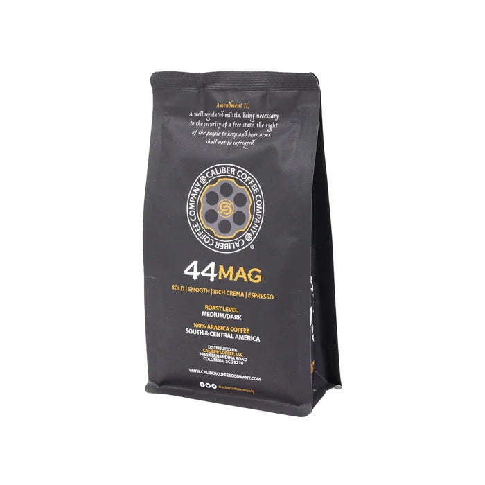 The Caliber Espresso Roast .44 Mag - Ground by Caliber Coffee Company offers bold, smooth espresso notes with a rich crema. Made from 100% Arabica beans from South and Central America, this specialty-grade coffee features a medium-dark roast.