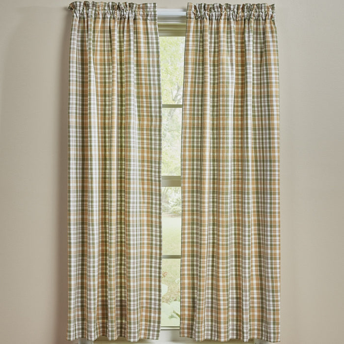 Sage & Mustard Plaid Short Panel Curtains 63" hanging in front of a window with a beige wall background