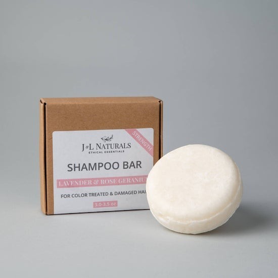Tea-Shirt Shoppe J&L Naturals strength shampoo bar for color-treated hair in eco-friendly cardboard packaging.